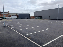 Car park with several empty spaces